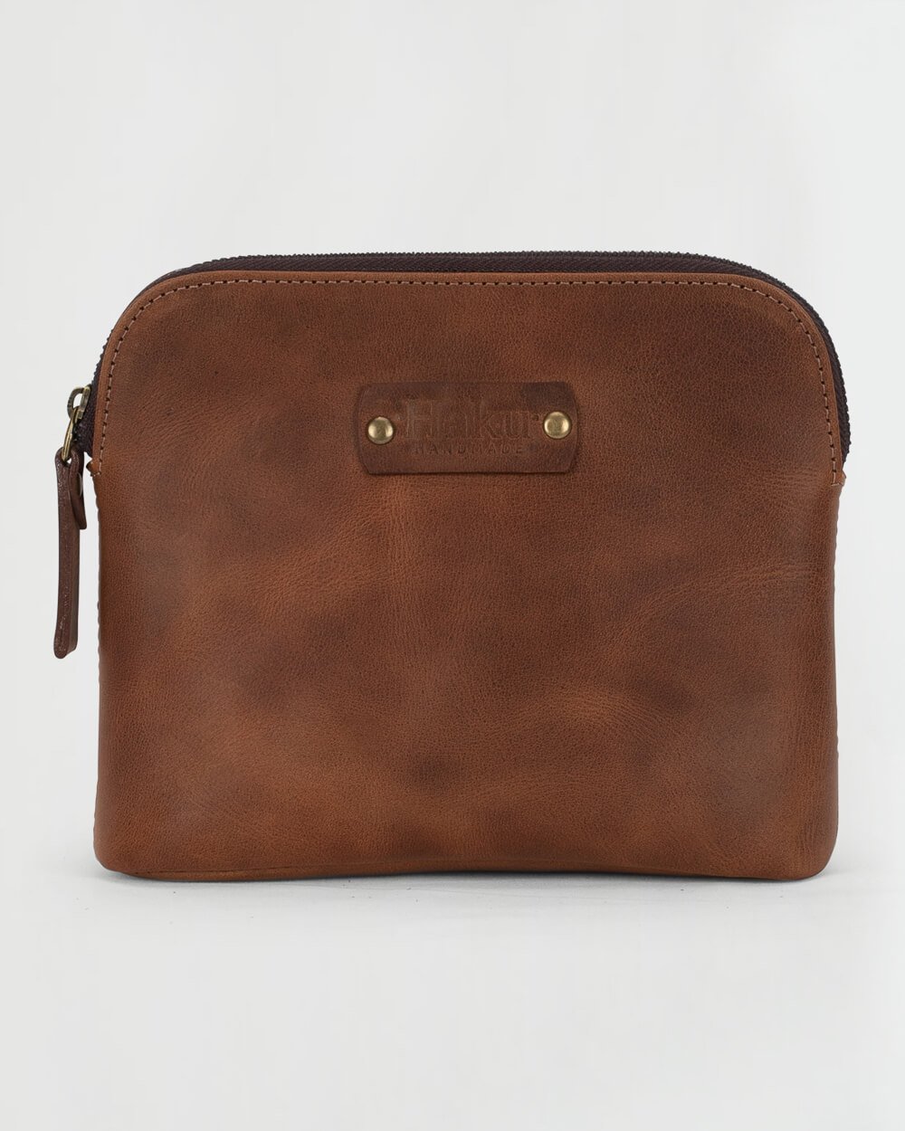 Cosmetiquera cuero café